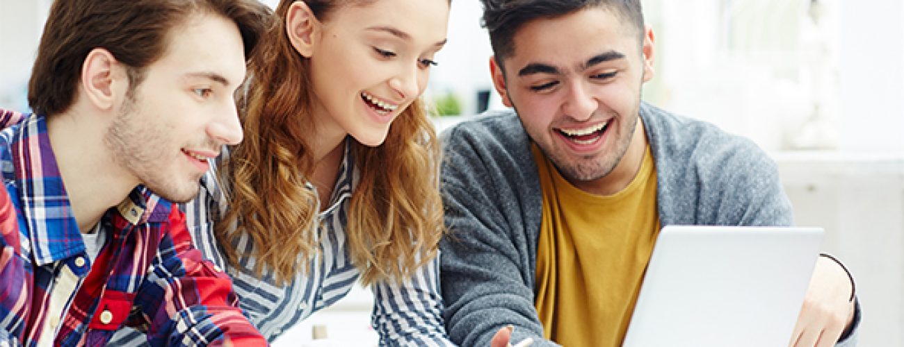 Happy learners video chatting with friends online