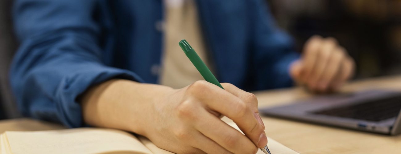 boy-studying-university-library